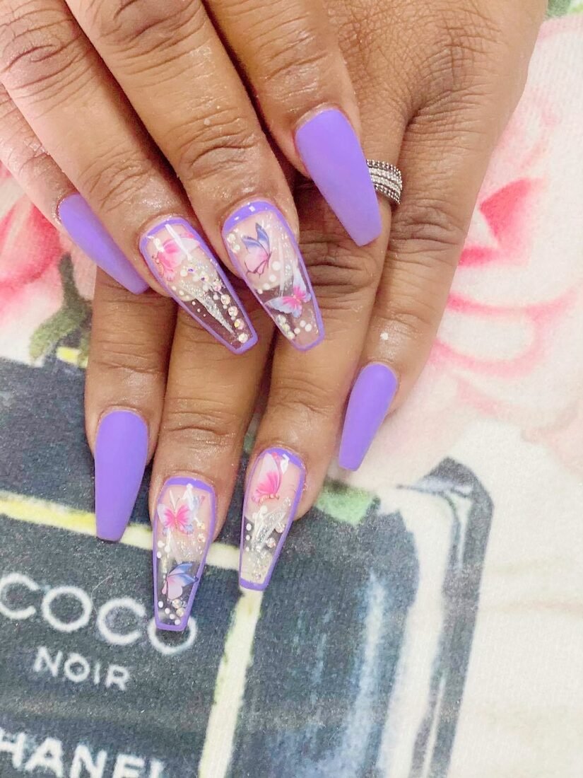 Long lilac coffin set with a hand-painted floral accent nail and glitter