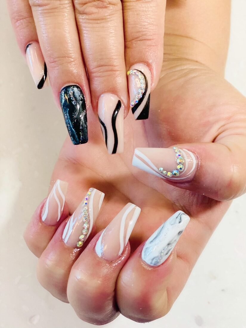 Mixed accent set with black marble, white swirls and rhinestone detail
