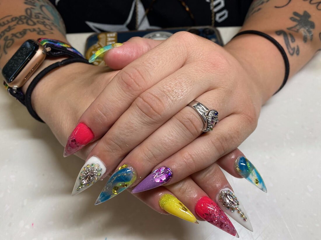 Stiletto set with a different design on every nail across both hands