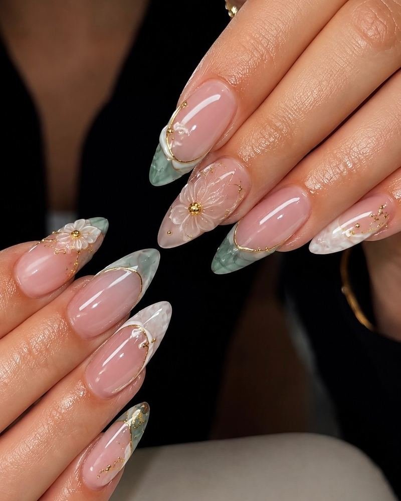 Sheer nude almond set with soft French tips and sculpted detail, made at Top Nails