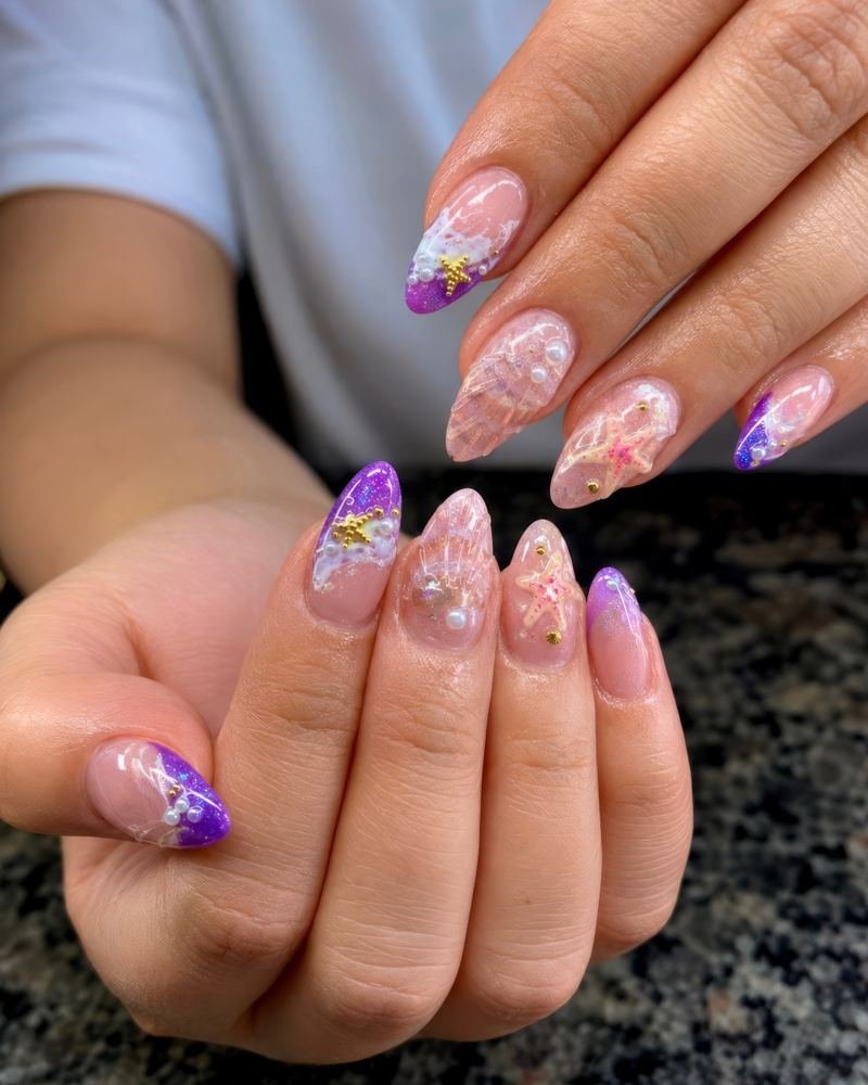 Purple and lilac almond set with three-dimensional flowers, made at Top Nails